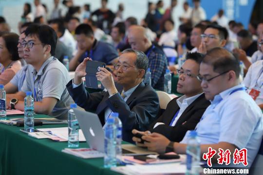 研討會現(xiàn)場圖?！■暮陚?攝