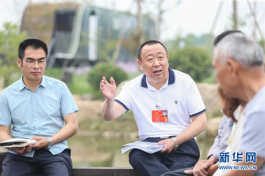 （新華全媒頭條·兩會精神看落實·圖文互動）（2）整體謀劃、系統(tǒng)升級、全面提升——落實全國兩會精神織牢織密公共衛(wèi)生防護網